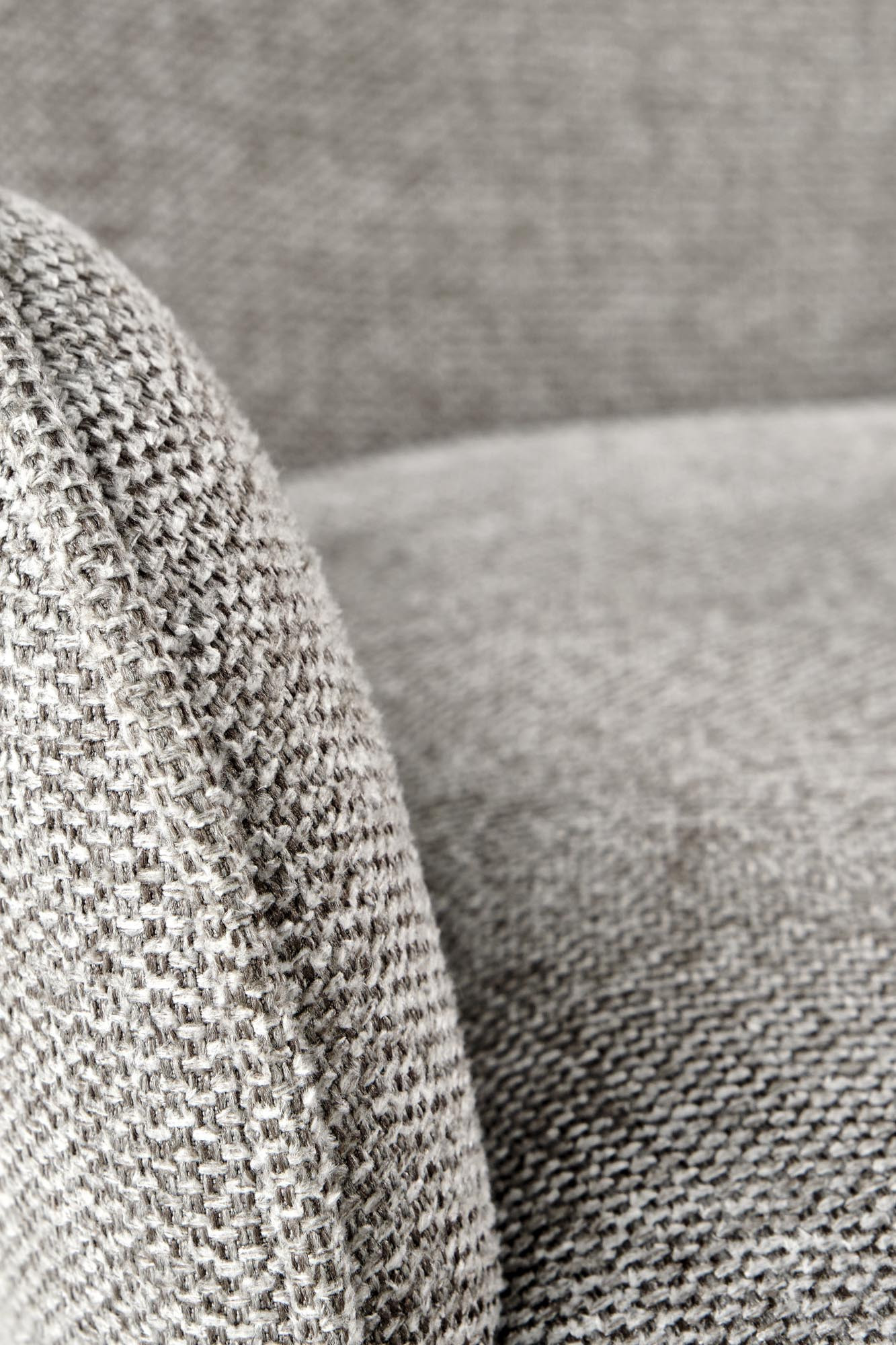 Zbliżenie na teksturę popielatego krzesła K481 z tapicerowanym siedziskiem i oparciem.