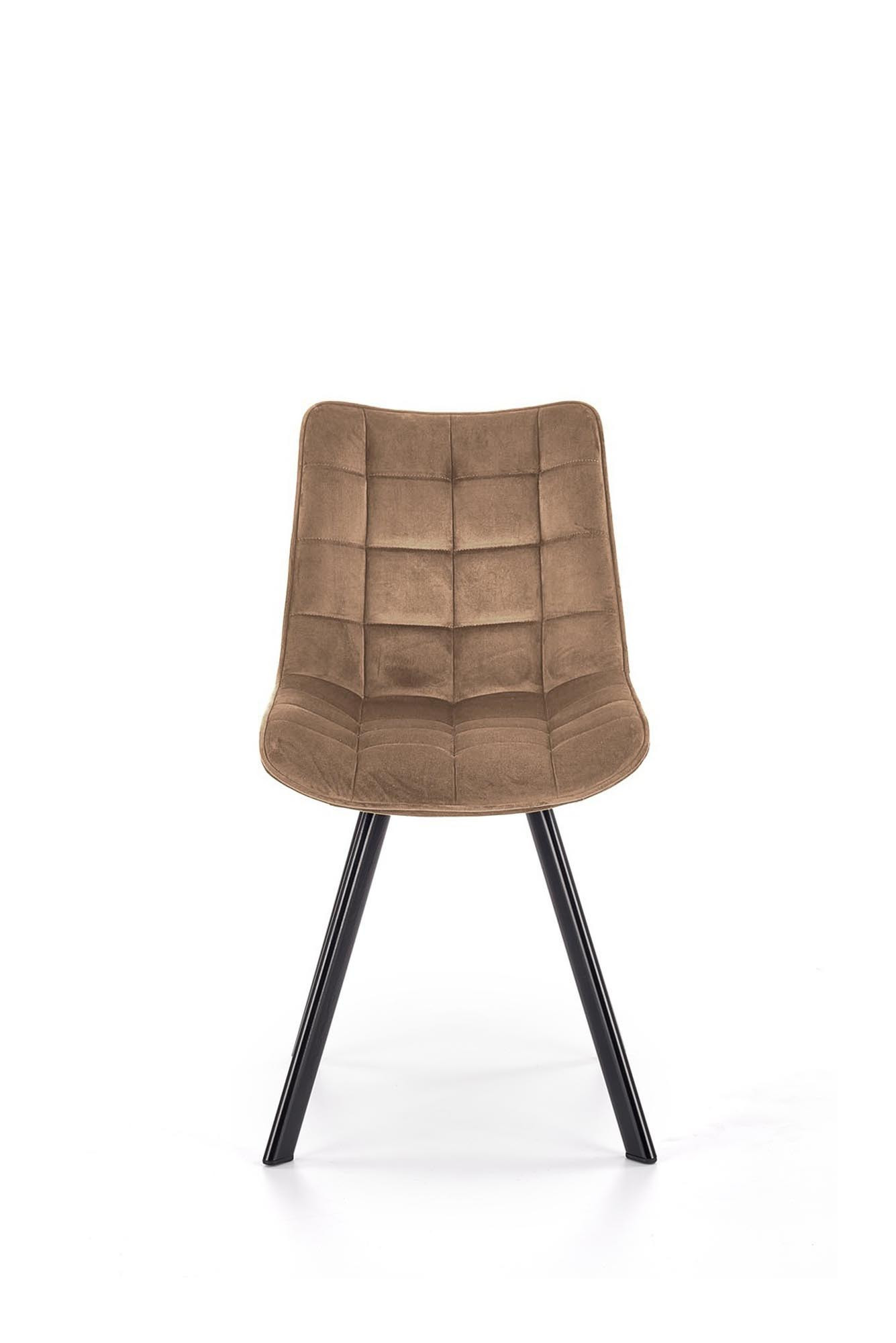 Beżowe krzesło K332 Bluvel 28 z pikowanym oparciem i czarnymi metalowymi nogami – widok z boku.