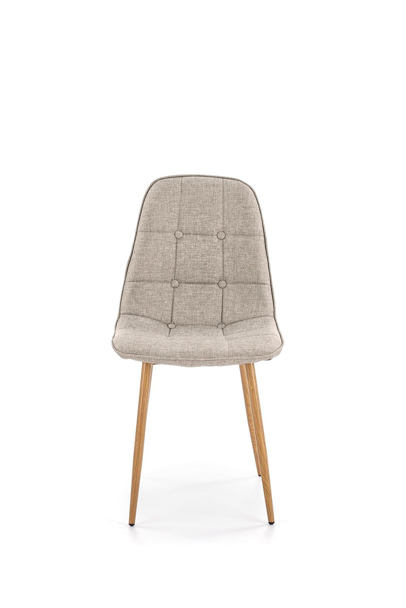 Beżowe krzesło K316 z pikowanym oparciem i stalowymi nogami w kolorze dąb miodowy – widok z przodu.