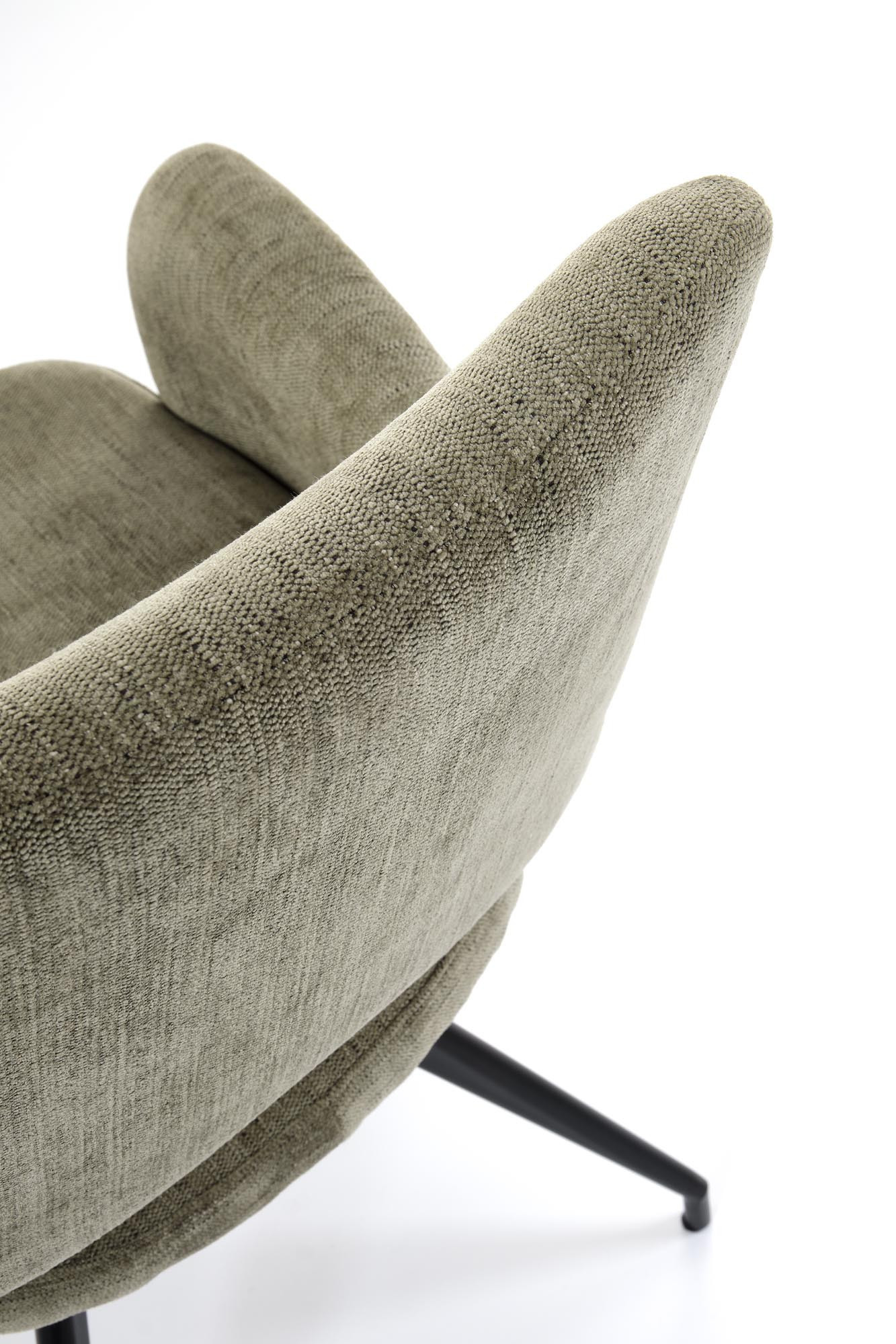 Zbliżenie na teksturę i kształt oparcia oliwkowego krzesła K542 z tkaniny i stalowymi nogami.