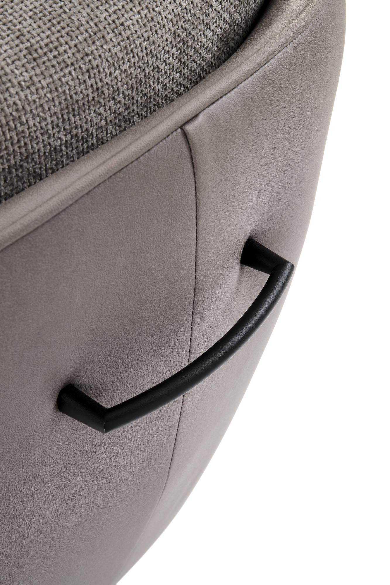 Zbliżenie na uchwyt i materiał obrotowego krzesła K554 z popielatej tkaniny i eco skóry.