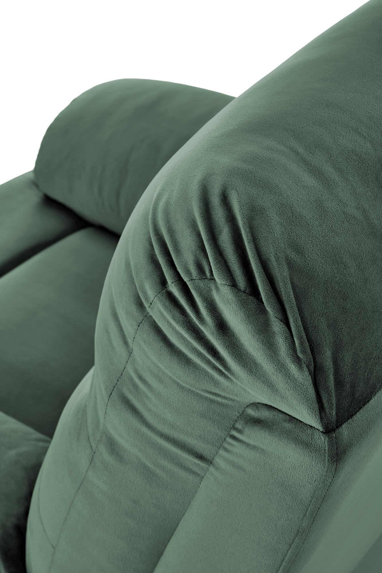 Zbliżenie na ciemnozieloną tkaninę velvet fotela wypoczynkowego DRAGER.
